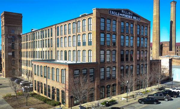 Located on the first floor of Eagle & Phenix Mill 3, CoWork Columbus is foot steps away from Uptown Columbus.