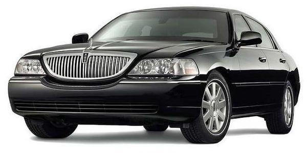 4 passengers Lincoln Town Car