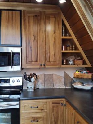 Hickory kitchen in A-frame house.