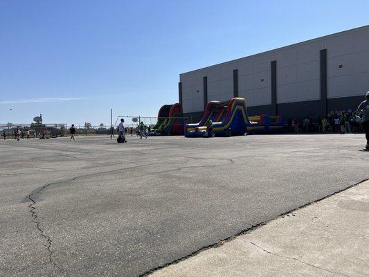 Basketball/volleyball courts On the right is the outside of the gym