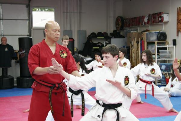 Teaching Traditional Taekwondo to young students develops strong minds, body and character.