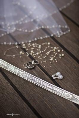 Wedding details. Veil, rings, and USMC officer's sword. The Queen Mary. Long Beach.