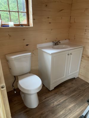 Off grid camp new Half bathroom.