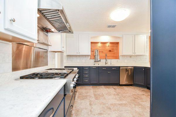 beautiful kitchen with tile flooring and stainless steel appliances