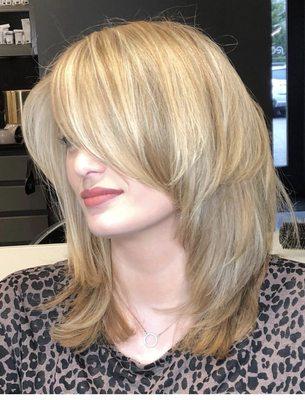 ORO SALON Textured medium length layered haircut I removed weight sculpting shape into her thick hair giving movement