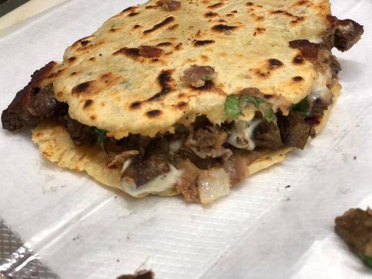 Beef Gordita with cilantro and onions