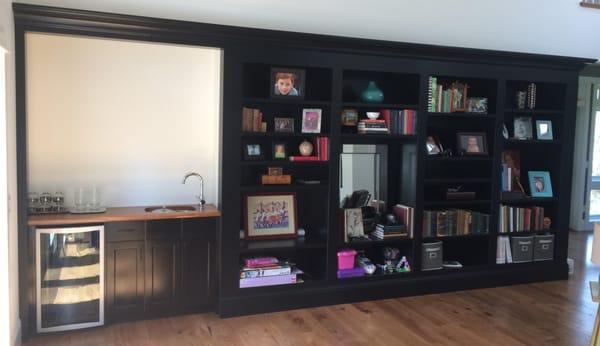 This multipurpose wall unit was built with several other cabinets by RS Schmidt and installed in a new home here in Port Ange...