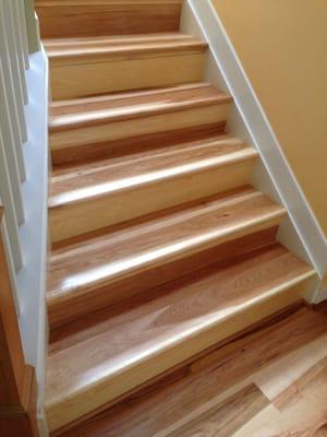 Character hickory plank & stair conversion installed in Annapolis, MD.