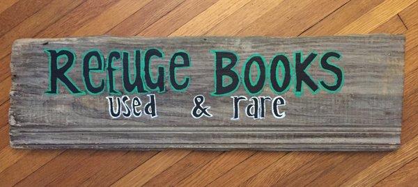 Hand-lettered sign for our humble beginnings.