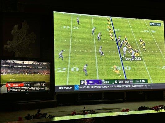 I need my binoculars to see the tiny TV playing the RAIDERS. While the Packers and Vikings play on the Large TV