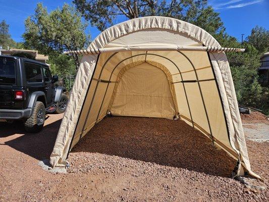 The original round auto storage but once inside you can't exit your vehicle. No hell from tractor supply or the 3rd party vendor.