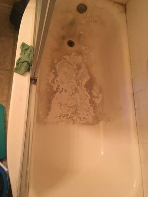 Bathtub had major grime build up.