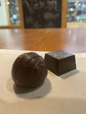 Dark chocolate champagne in the front ($2) in front and London Fog (earl grey and vanilla in dark chocolate) ($3) in back