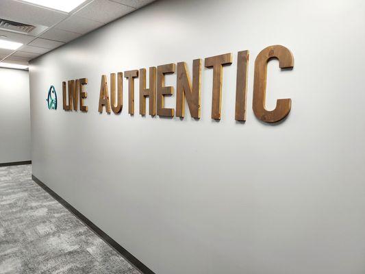 "live authentic" sign