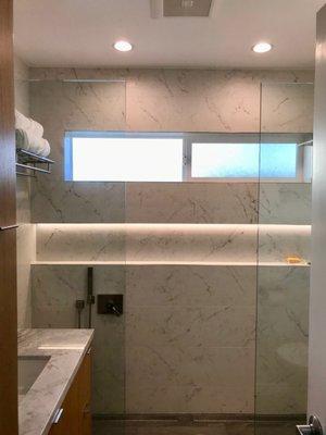 Light fixture fabricated by Environmental Lights for shower niche