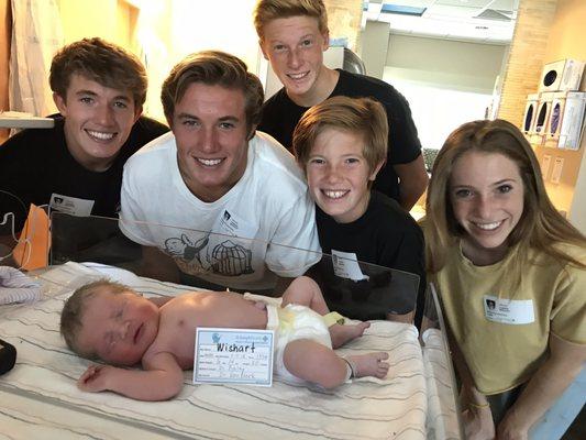 Olsen style smiles on display... as my kids meet baby brother, a future patient of Dr. Olsen, for the first time!!