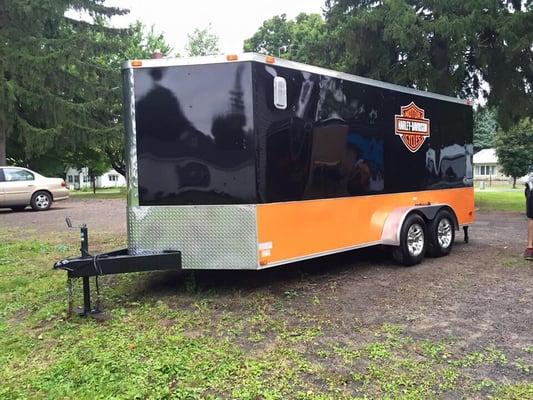 After polishing the diamond plate and buffing the black and orange siding, this trailer will definitely stand out traveling down the road.