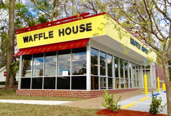 This is the newest concept of Waffle House.  Older locations have brick that rise up to where the top window begins.