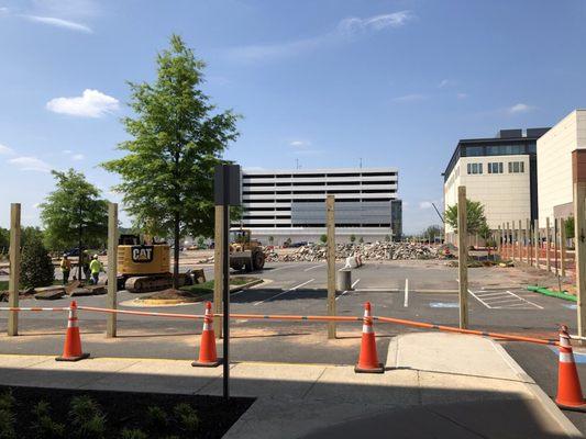 View from building B front door, that parking garage in the distance is now where every resident has to walk to park.