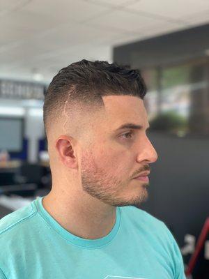 Mid high fade with beard line up