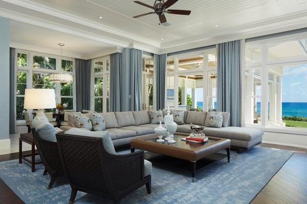 This beautiful family room features inlaid enameled wood ceilings, hidden drapery pockets, an outdoor summer kitchen and hard...