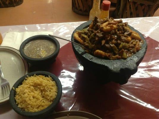 Sizzling three meat plate called "armadillo"