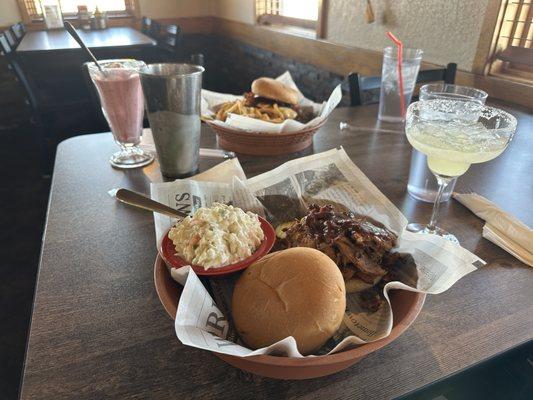 Brisket sandwich, kickin bourbon burger, margaritas, milkshake, coleslaw, house fries.