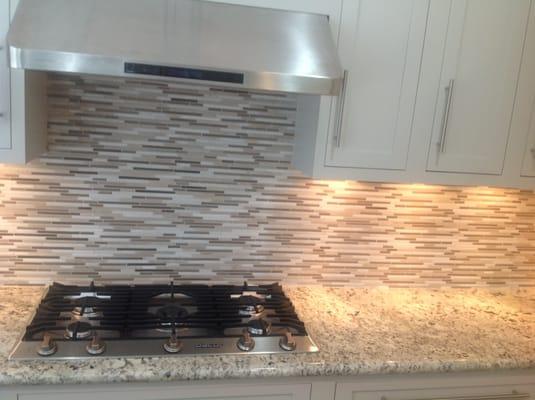 Kitchen counter top and back splash with new stove top