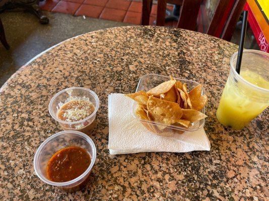 Appetizer with chips, beans, and salsa