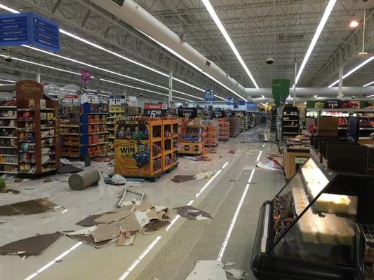 Extracting water from the Troy, AL Walmart after a tornado collapsed part of the roof.