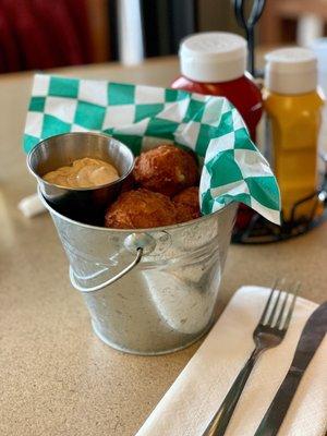 Palmer Balls! With a side of horseradish dipping sauce. Little deep-fried potato balls...delicious!