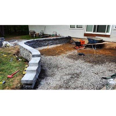 Installing a sitting wall for a fire pit area