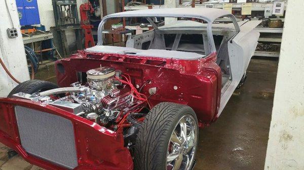 59 Impala restoration body just set back on the frame with firewall painted