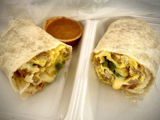 Sausage/egg/cheese/hash-browns w/ jalapeños breakfast burrito. Red chile salsa on side. Nice.