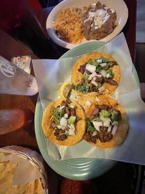 Steak tacos and beans and rice