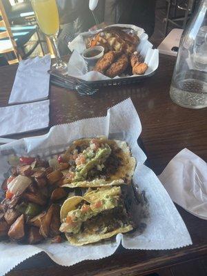 Chicken and waffles and steak tacos