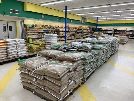 Wild bird seed pallet area along with horse,chicken,and other family flock feeds.