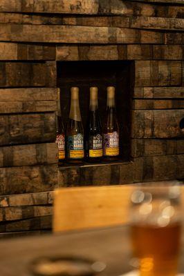 Speakeasy display of Hive & Barrel Mead wines.