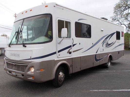 2005 Daybreak Class A motorhome, 31.5' Ford V10, under 50,000 miles.