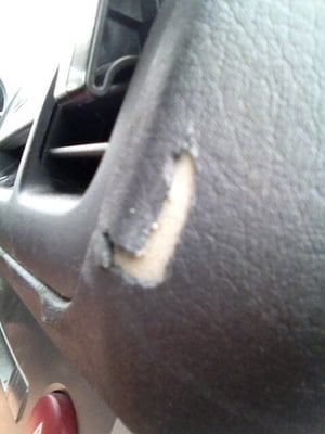 Damage to dashboard where airbag would be replaced