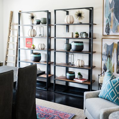 Open shelving with coastal accessories.