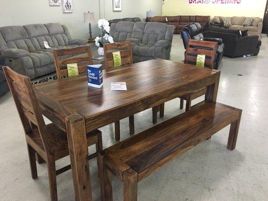 This real wood dining table was gorgeous.