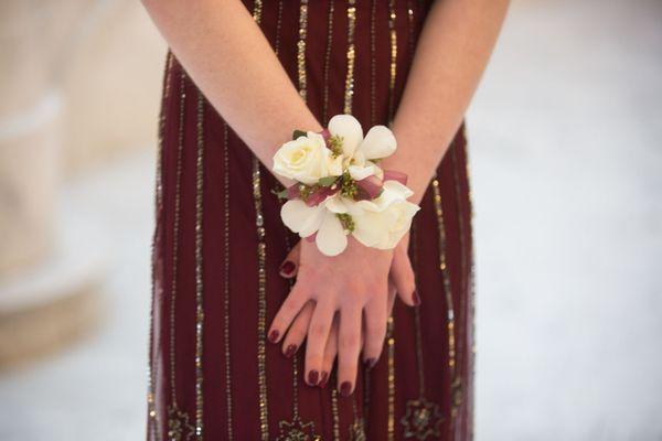 White rose and orchid corsage