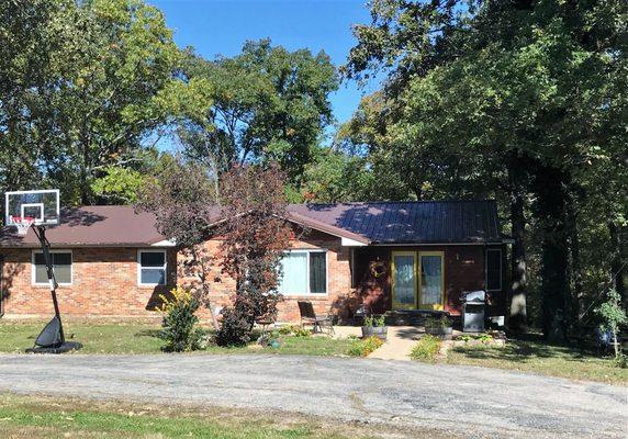 This beautiful home sits on 7+acres and has a huge work shop with overhead doors, bathroom with it's own septic.