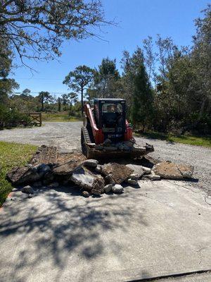 Site work services available. Here we are removing a driveway to prepare for asphalt.