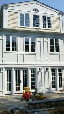 Custom windows and panels can change the appearance of a house.