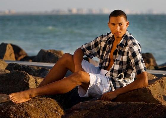 Photographing a model on the rocks of Honeymoon Island at sunset can produce beautiful photographs.