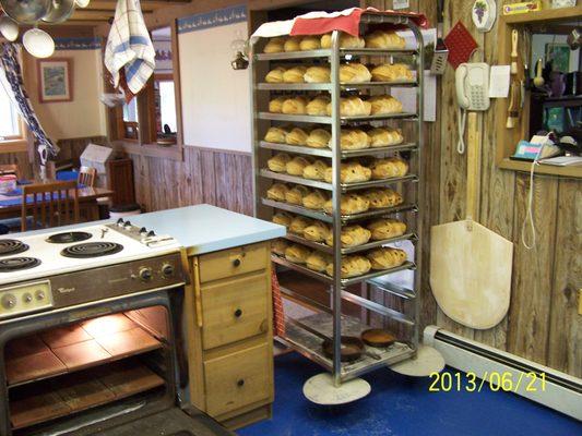 A typical 64-loaf day in my home kitchen, where I bake everything.  (1970's-era Whirlpool electric oven!)