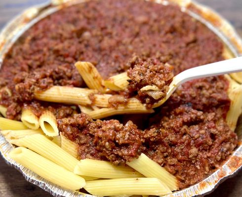 Pasta with meat sauce meal - comes with your choice of pasta + bread & butter + side salad