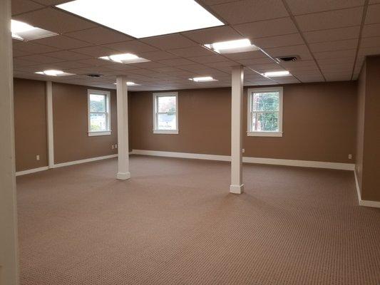 Top floor corner rental w/ utilities included!  Spacious & bright w/ many windows & skylight. Has 2 entries & separate office/waiting room.